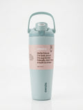 Owala FreeSip Tumbler with travel-grip handle in Sage Green, hero shot