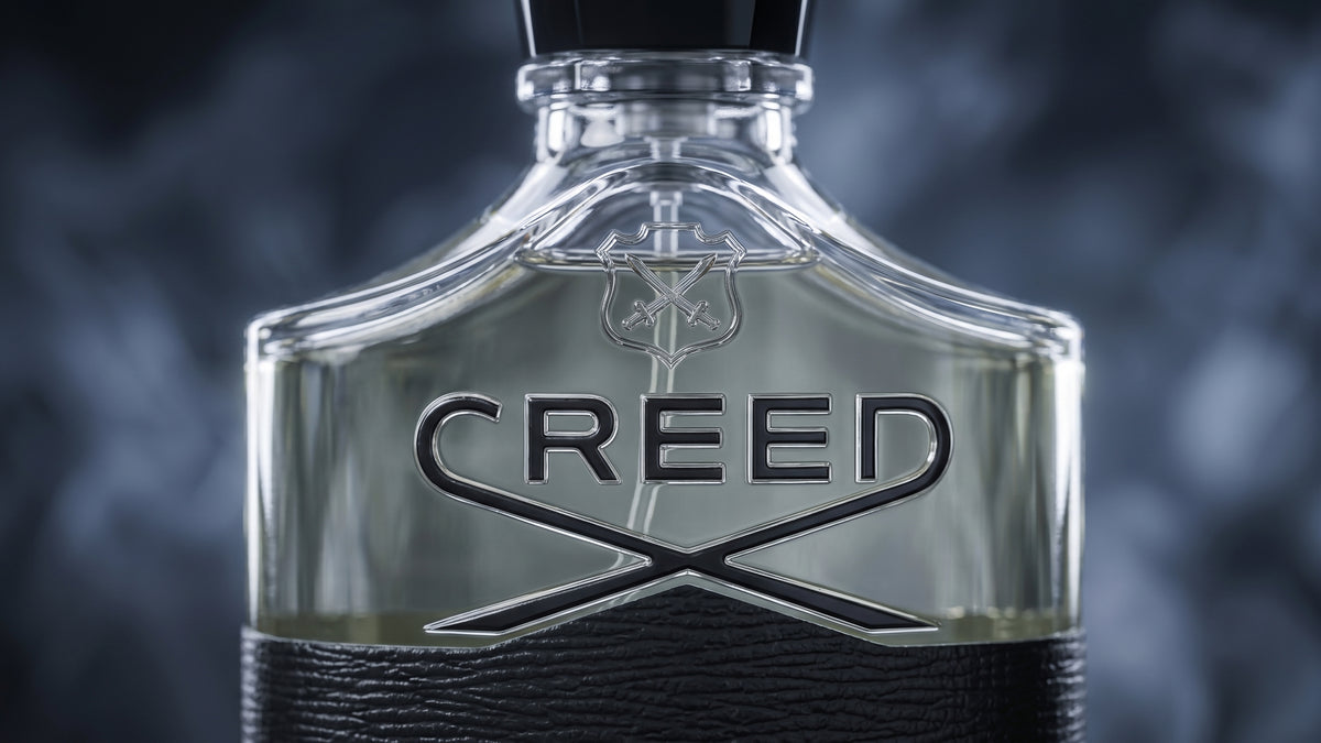 Creed Aventus bottle macro close-up of Creed logo